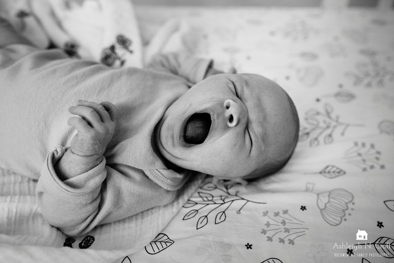 newborn baby yawning