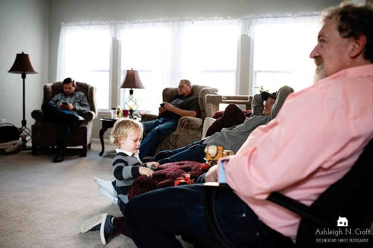 family sitting in living room