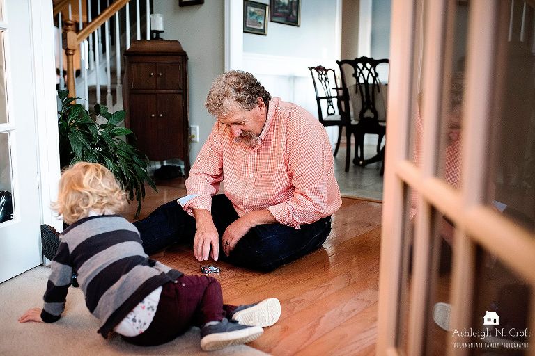 grandfather and grandson playing