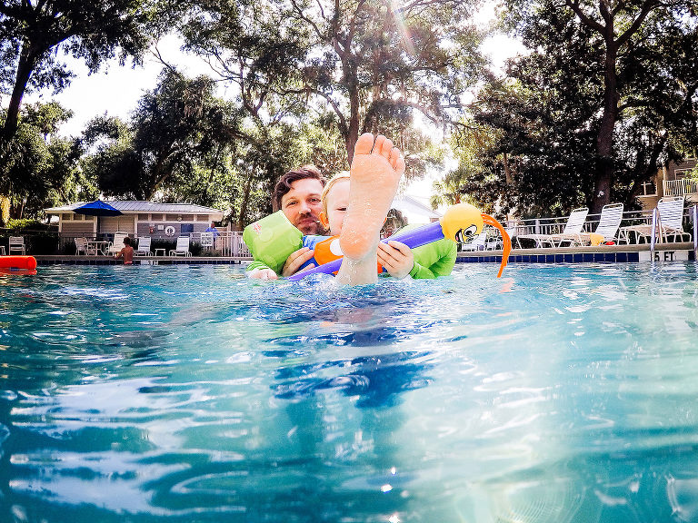 little boy foot in pool